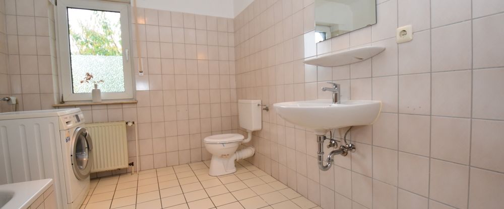 Dachgeschoswohnung mit Garage in ruhiger Siedlungslage in Markhausen - Foto 1