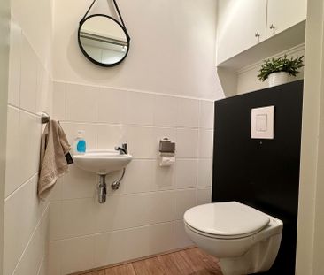 Ruim en gezellig appartement van 90 m² met 2 slaapkamers en garagebox - Photo 4
