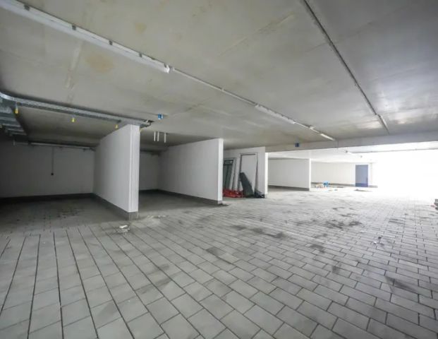 Traumhafte Neubauwohnung im Souterrain mit großem eigenen Garten - Foto 1