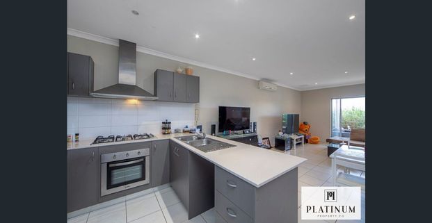 Comfortable, Low Maintenance Living in a Handy Location - Photo 1