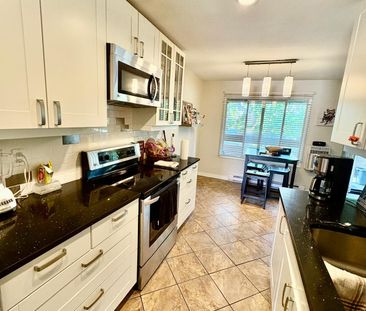 Bright & Spacious Upper Unit - Photo 3
