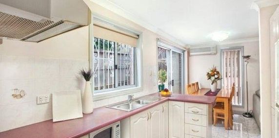 Three Bedroom Well Maintained Townhouse - Photo 2