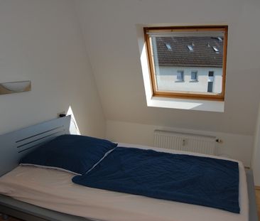 Moderne und helle 2-Zimmerwohnung mit Dachterrasse in schöner Wohnlage! - Photo 3