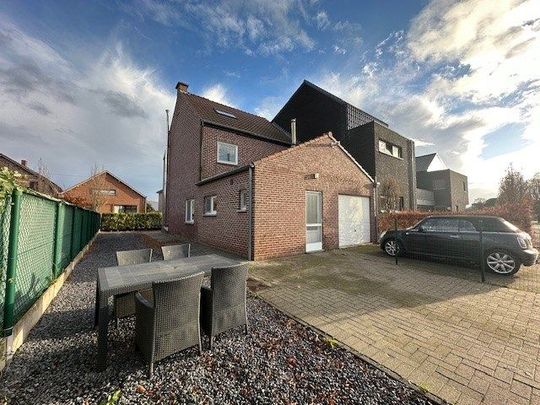 Een nette, comfortabele gezinswoning met 3 slaapkamers, garage en tuin. - Foto 1