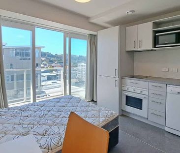 Peak Apartments - Photo 1