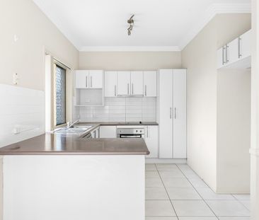 Charming 3-Bedroom Home with Modern Comforts - Photo 1