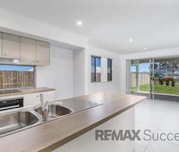 Modern Glenvale Living with Private Yard & Double Garage in Conveni... - Photo 4