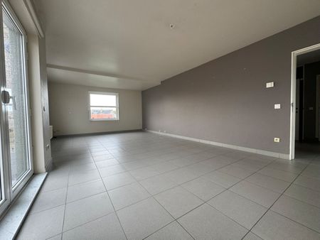 Energiezuinig en centraal gelegen 2-slaapkamerappartement met garage - Photo 3