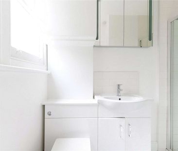 Studio apartment situated in this handsome period building, located... - Photo 6