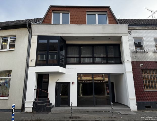 RIDA FLATS - Moderne Erdgeschosswohnung mit großzügigem Wohnbereich und Gartenblick - Photo 1