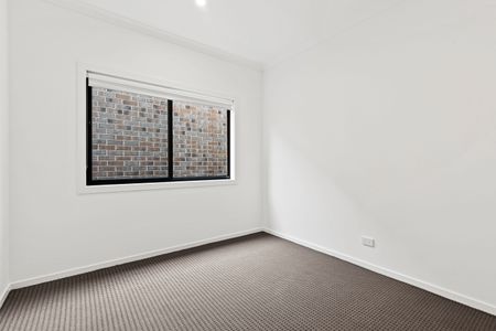 Spacious 4-Bedroom Home with Modern Features in Wollert - Photo 3