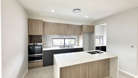 Brand New 5 Bedroom Home with Separate Guest Suite | Solar + Batteries | Walk to Shops & Transport - Photo 5