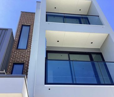 Luxury Four-Level Townhouse with Private Lift & Multiple Living Zones - Photo 5