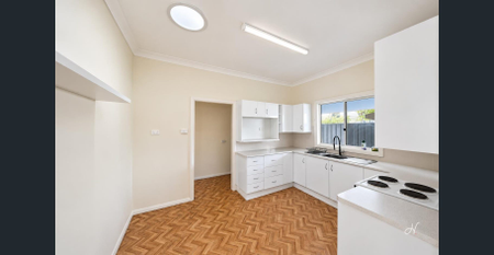 Comfortable Single-Level Living with a Fully Fenced Yard - Photo 5