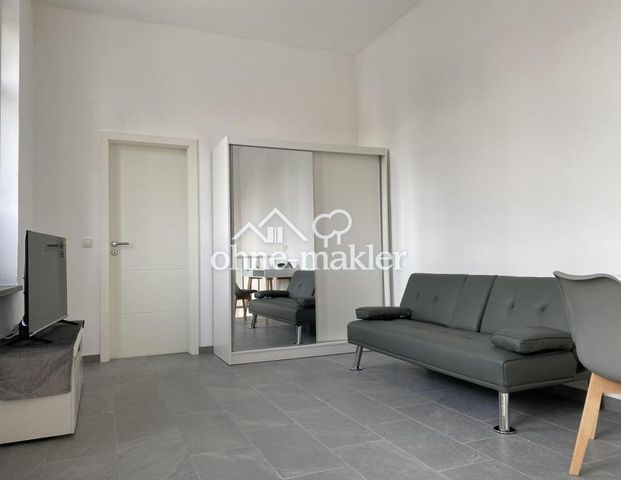# Frisch renoviertes Design-Apartment – voll möbliert, 2 Bäder & Garten inkl. WLAN in zentraler Lage - Photo 1