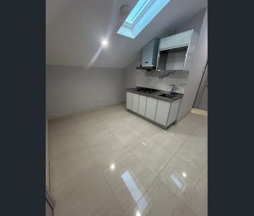 Spacious, Well-Maintained Boutique Studio Apartment in Prime Location - Photo 6