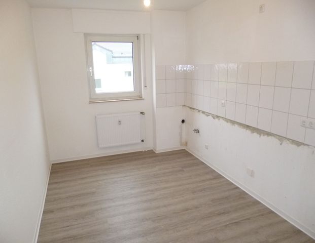 Attraktive Erdgeschoss-Wohnung mit Balkon - Foto 1