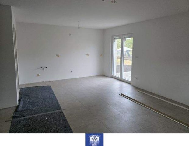 Perfektes Einfamilienhaus mit moderner EBK und großer Wohlfühlterrasse! - Photo 1