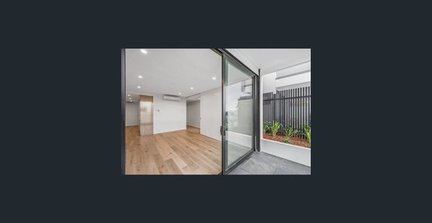 Ideally Located Modern One Bedroom Apartment - Photo 1