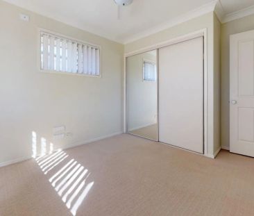 Spacious 4-Bedroom Family Home with Multiple Living Areas & Double ... - Photo 6