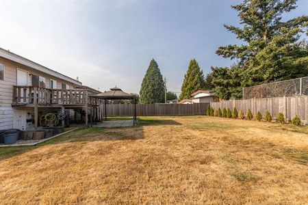 Upper Home with Large Fenced Yard - Photo 5