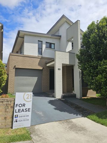 Spacious 4-Bedroom Home in Pemulwuy - Photo 5