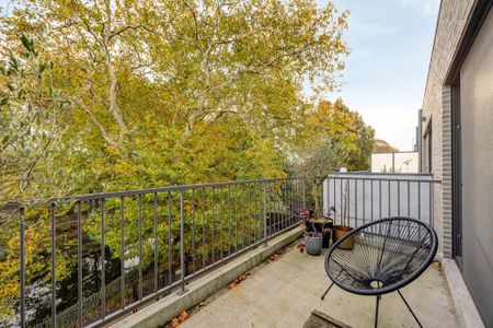 Recent appartement met lift , 2 slaapkamers, terras en PARKTUIN! - Photo 3