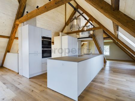 Charming 3.5-room penthouse apartment in a central location in Bätterkinden - Photo 4