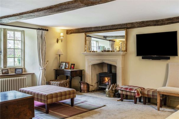 A magnificent Grade II listed Cotswold farmhouse with substantial converted barn, set in about 3.5 acres. - Photo 1