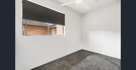 Newly Renovated | Modern Top Floor, 2 Bedroom Unit with Garage - Photo 3