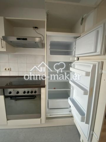 Gemütliche, sonnige 2-Zimmer-Dachgeschosswohnung mit Einbauküche und Dachterrasse - Photo 2