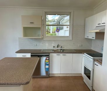 FRESHLY UPDATED HOME IN A FAMILY-FRIENDLY LOCATION - Photo 2