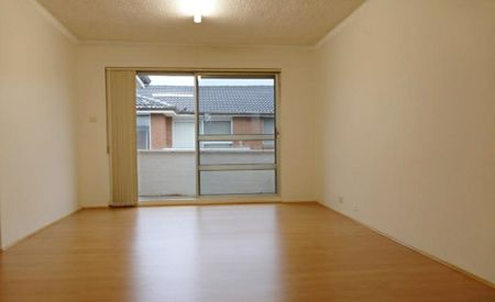 STUNNING TOP FLOOR UNIT WITH GARAGE/STORAGE - Photo 3