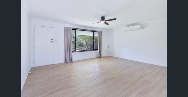 Property Managed I Modern Comfort and Prime Convenience in Southport - Photo 1