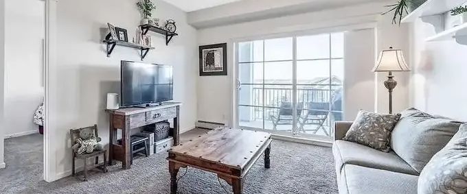 Beautiful 3rd Floor Condo with Stunning Pond Views | Calgary - Photo 1