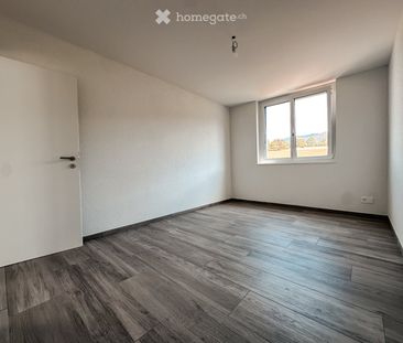 Spacieux appartement 4.5 pièces neuf à Courtételle - Photo 1