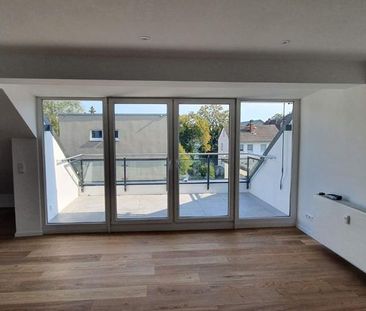 Charmante Penthousewohnung direkt am Park - Photo 1