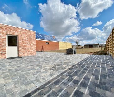Vernieuwde woning met zonnige afgesloten tuin en private oprit - Photo 4