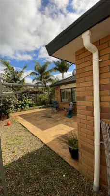 WELL PRESENTED BRICK AND TILE HOME - Photo 1