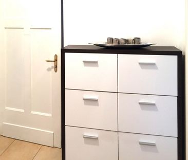 Möblierte Erdgeschosswohnung, 3ZKB mit Einbauküche, Terrasse und Ga... - Foto 1