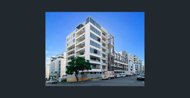 Modern Two-Bedroom Haven in Vibrant Rhodes - Photo 1