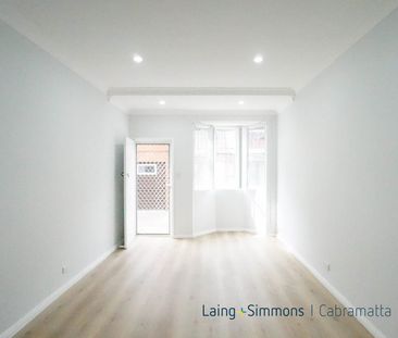 FULLY RENOVATED TOWNHOUSE - Photo 1