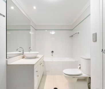 One Bedroom Apartment Flooded with Natural Light - Photo 4