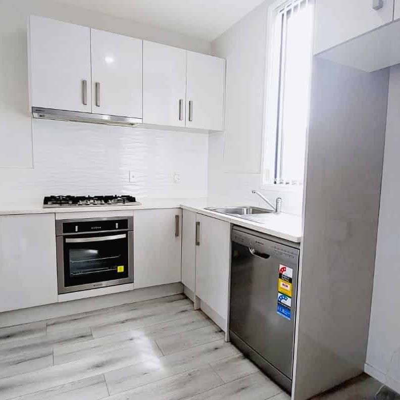 Trendy near new terraced home - Photo 1