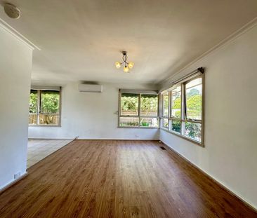 Spacious Family Home with Ample Parking and Modern Amenities - Photo 2