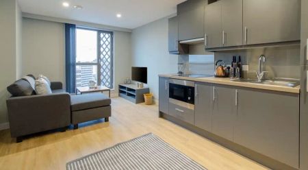 Deluxe 2 Bed Apartment - Photo 2