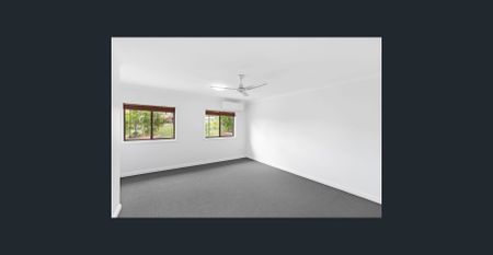 Spacious Two-Bedroom Townhouse in Convenient Location - Photo 4