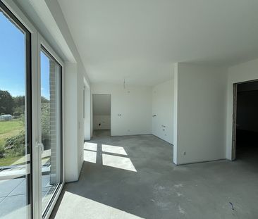 Vermietung: Erstbezug, moderne Obergeschosswohnung mit Balkon und C... - Foto 1