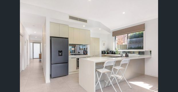 Double Story Modern Home with Large Built-in BBQ area - Photo 1