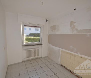 Charmante 3-Zimmer-Dachgeschosswohnung in Neu-Isenburg mit Garage - Photo 1